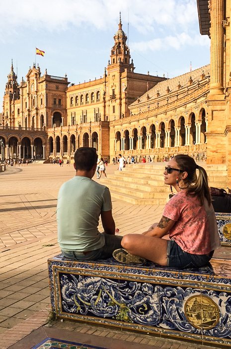 A couple relaxing outside a famous building