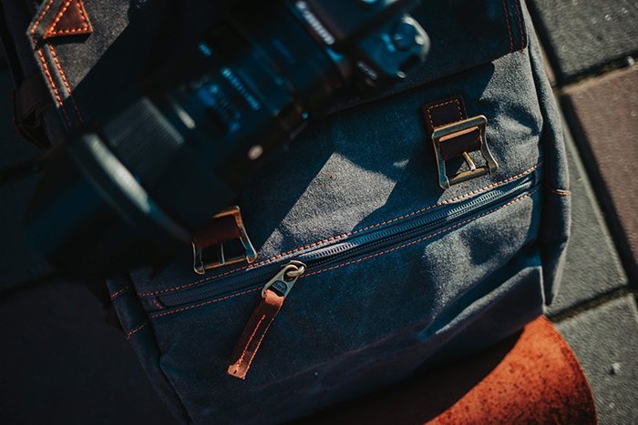 Top view of a fabric bag with a camera on top of it